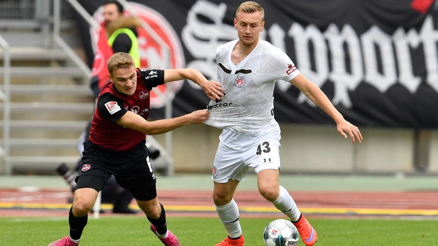 Alles geben auf St. Pauli: Nach der Länderspielpause ist der 1. FC Nürnberg mit Tim Handwerker (li.) beim Kiez-Klub gefragt.