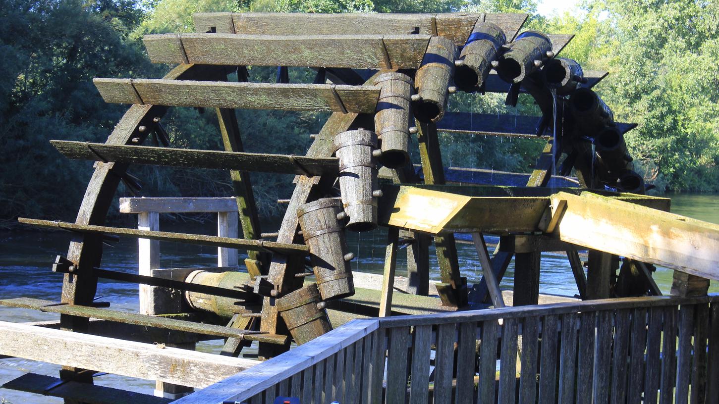 Das Wasserrad an der Regnitz ist damals wie heute ein markantes Symbol für die selbstbewussten Stadelner. 