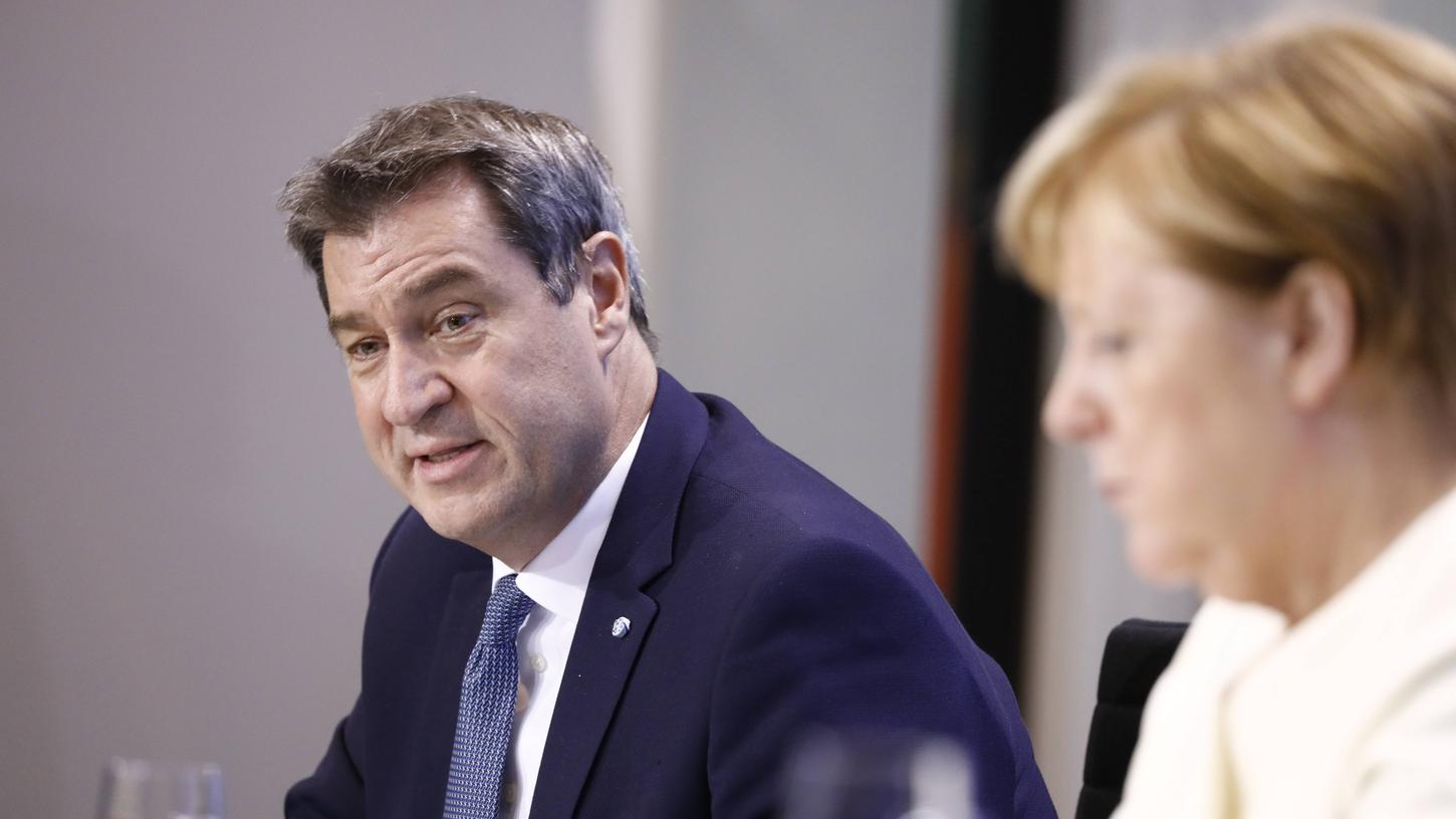Nach einer Videokonferenz verkünden Angela Merkel und Markus Söder die neuen Corona-Regelungen.