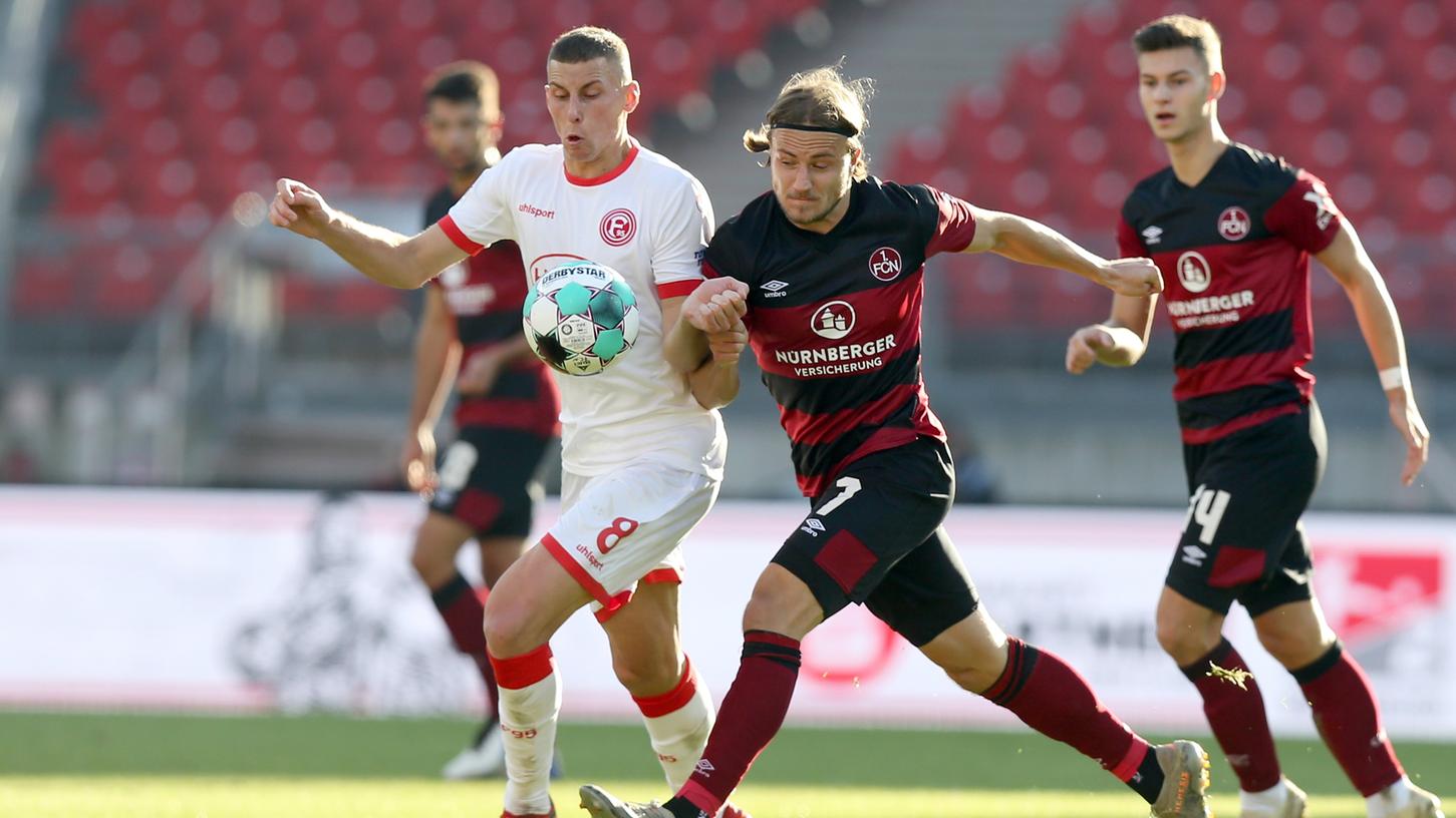 07.11.2020 --- Fussball --- Saison 2020 2021 --- 2. Fussball - Bundesliga --- 07. Spieltag: 1. FC Nürnberg FCN ( Club ) - Fortuna Düsseldorf F95 --- Foto: Sportfoto Zink/DaMa --- DFL regulations prohibit any use of photographs as image sequences and/or quasi-video - only for editorial use ---
Jakub Piotrowski (8, Fortuna Düsseldorf F95 ) Felix Lohkemper (7, 1. FC Nürnberg / FCN ) 07.11.2020 --- Fussball --- Saison 2020 2021 --- 2. Fussball - Bundesliga --- 07. Spieltag: 1. FC Nürnberg FCN ( Club ) - Fortuna Düsseldorf F95 --- Foto: Sportfoto Zink/DaMa --- DFL regulations prohibit any use of photographs as image sequences and/or quasi-video - only for editorial use ---
Jakub Piotrowski (8, Fortuna Düsseldorf F95 ) Felix Lohkemper (7, 1. FC Nürnberg / FCN )