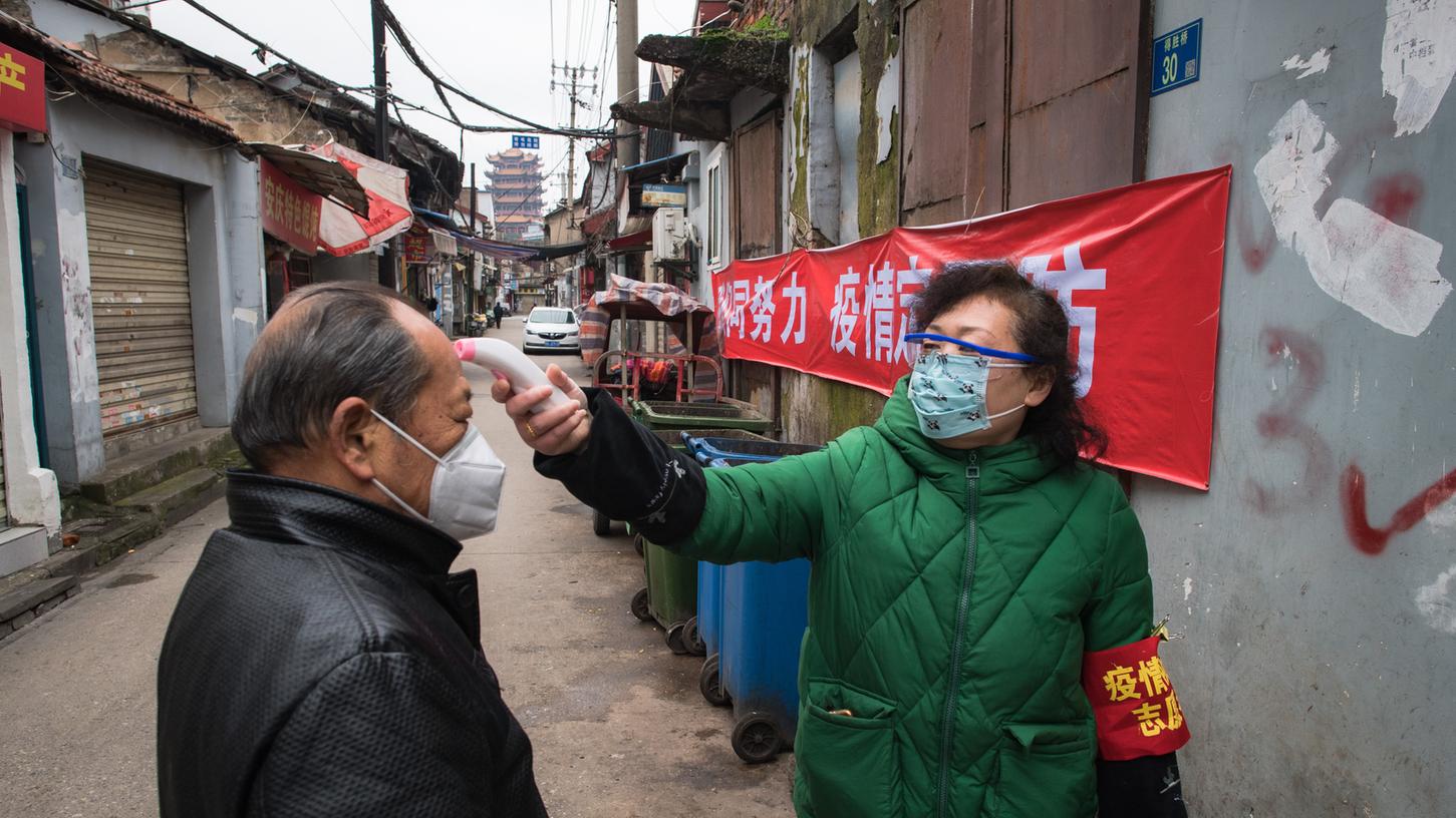  China verzögert weiter die Einreise von Experten, die im Auftrag der Weltgesundheitsorganisation (WHO) die Ursprünge des Coronavirus erkunden sollen. 