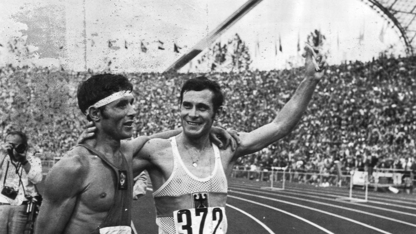 Olympiasieger! Am 3. September 1972 ließ sich Bernd Kannenberg (Arm in Arm mit dem Zweitplatzierten Weniamin Soldatenko) im vollen Münchner Olympiastadion feiern. 