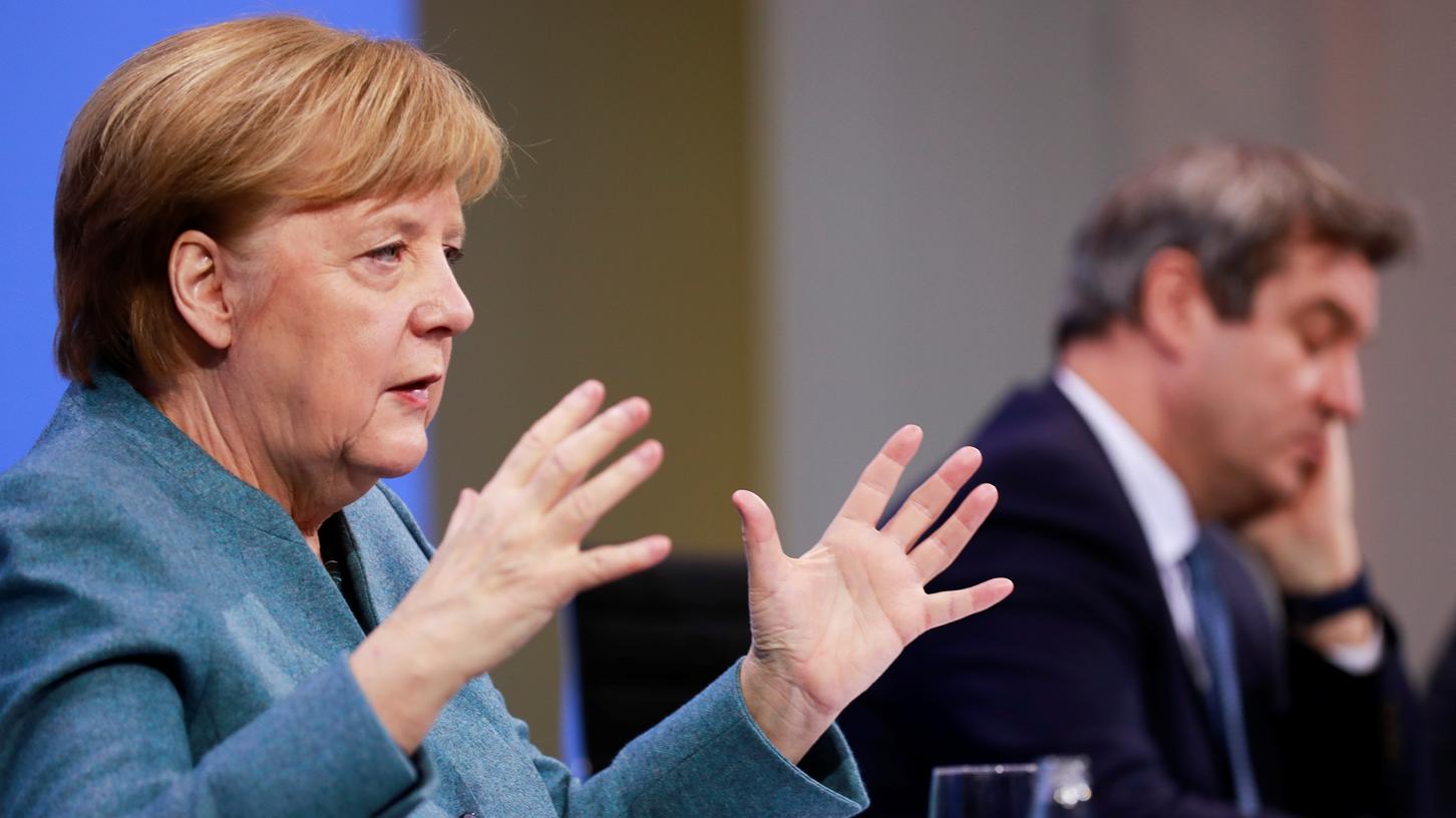 Merkel spricht auf der Pressekonferenz im Anschluss and den "Impfgipfel".