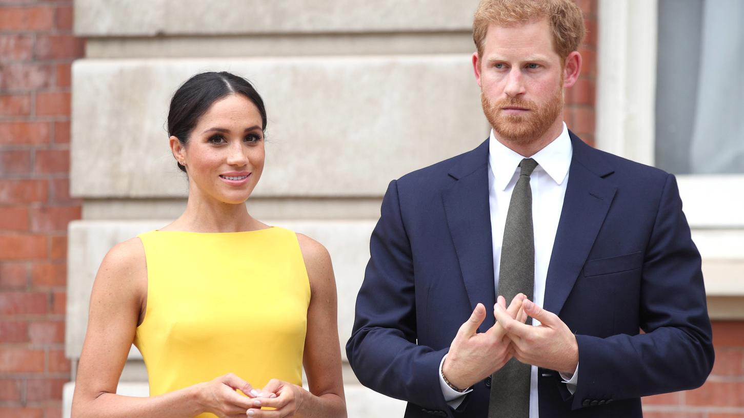 Prinz Harry von Großbritannien und seine Frau Meghan während des Empfangs Prinz Harry von Großbritannien und seine Frau Meghan während des Empfangs