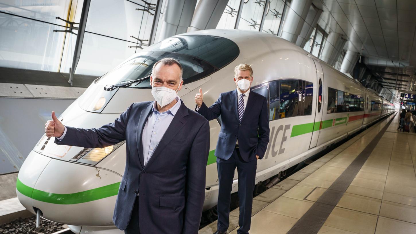 Berthold Huber, Vorstand für den Personenverkehr bei der Deutschen Bahn (links) und Lufthansa-Vorstandsmitglied Harry Hohmeister haben eine neue Kooperation vereinbart, von der auch Nürnberg profititert.