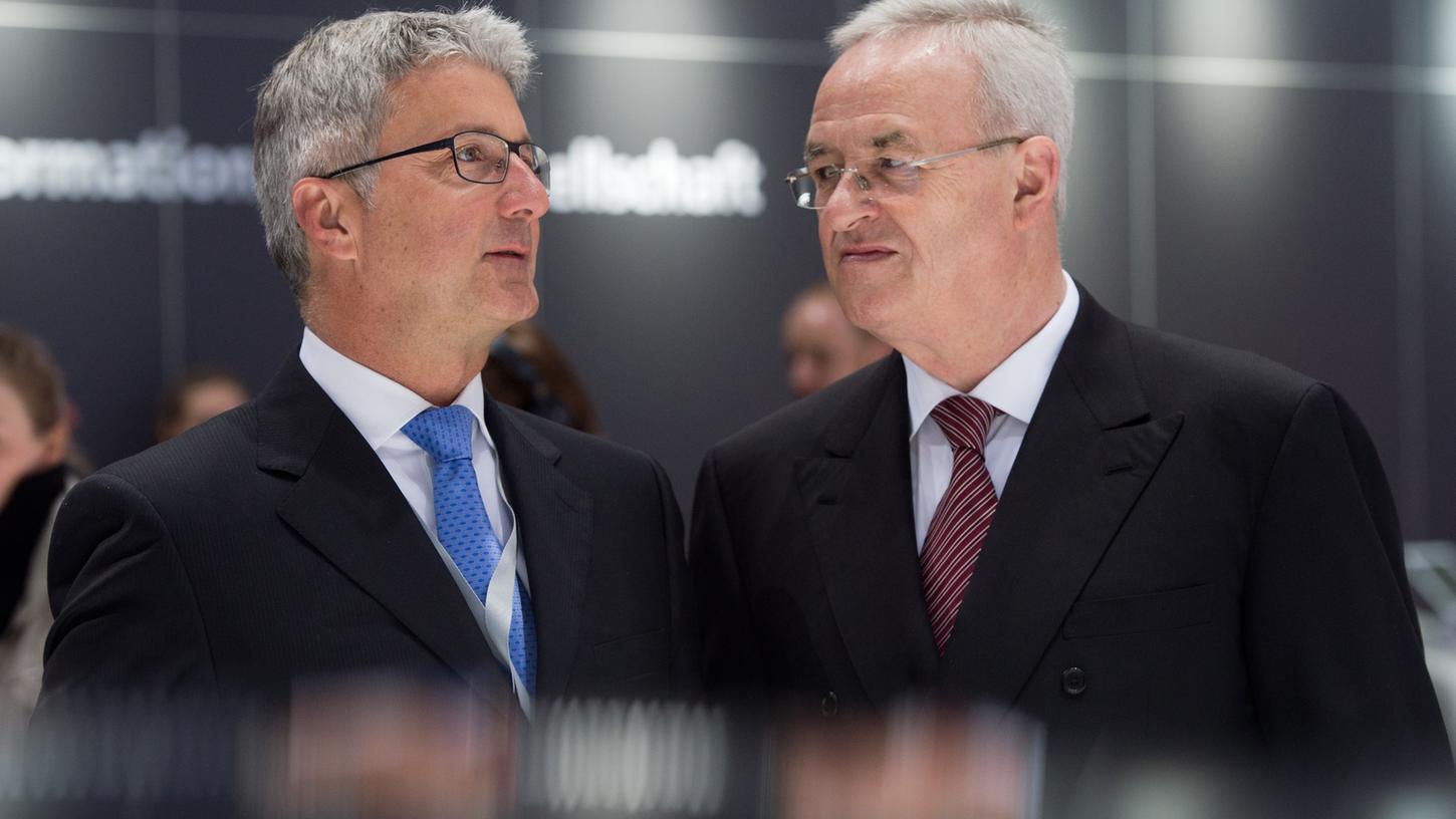 Unter Druck: der damalige Vorstandsvorsitzende der Volkswagen AG, Martin Winterkorn (rechts), und der damalige Vorstandsvorsitzende der Audi AG, Rupert Stadler, im Jahr 2014. 