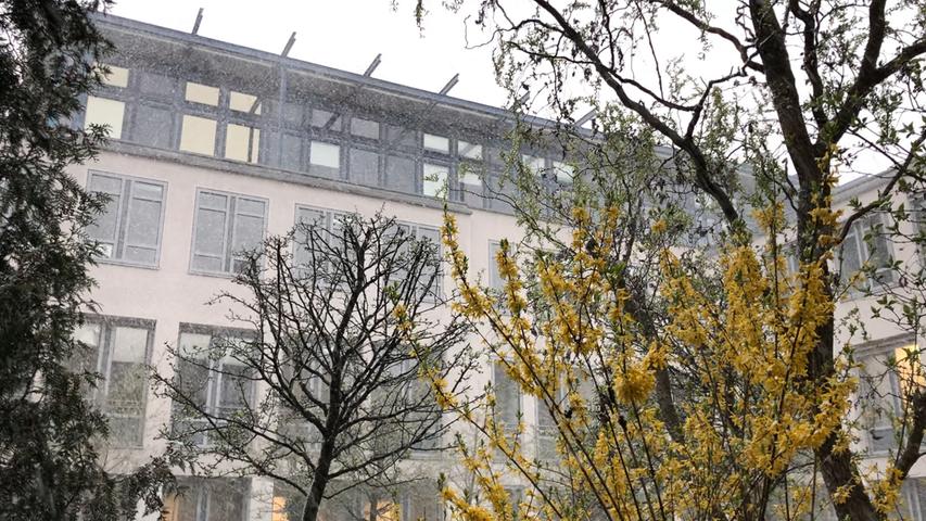 Aprilwetter schlägt zu: Zarte Schneeschicht bedeckt Nürnberg