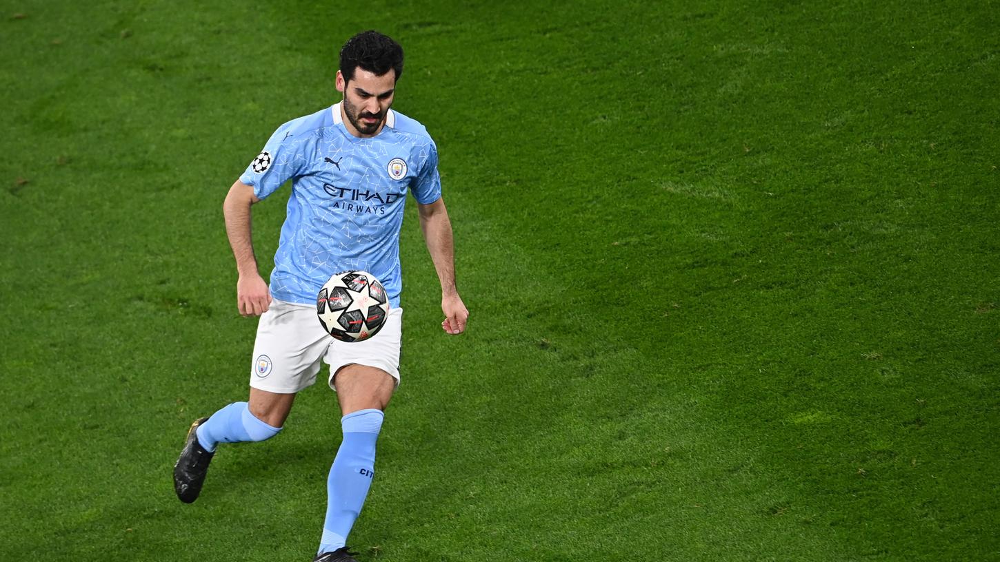 Ilkay Gündogan, dessen Klub Manchester City gemeinsam mit elf weiteren Vereinen eine Super League gründen möchte, könnte von dem Spielerbann betroffen sein.
Ilkay Gündogan, dessen Klub Manchester City gemeinsam mit elf weiteren Vereinen eine Super League gründen möchte, könnte von dem Spielerbann betroffen sein.