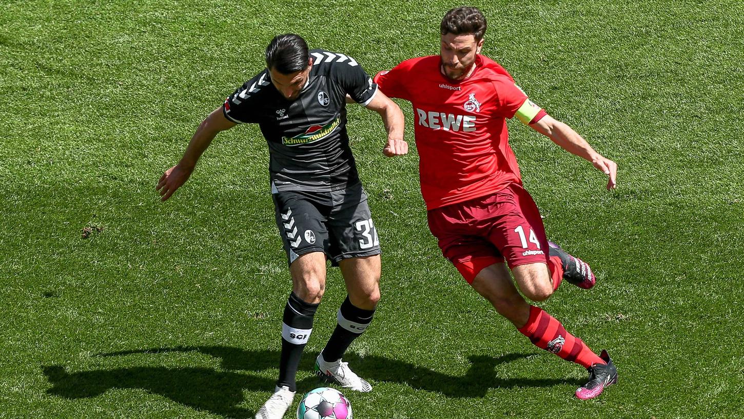 Seltenes Bild: Kölns Jonas Hector (rechts) war auch nie in einem NLZ und duelliert sich hier mit Freiburgs Vincenzo Grifo, der nur ein Jahr im NLZ verbrachte. 