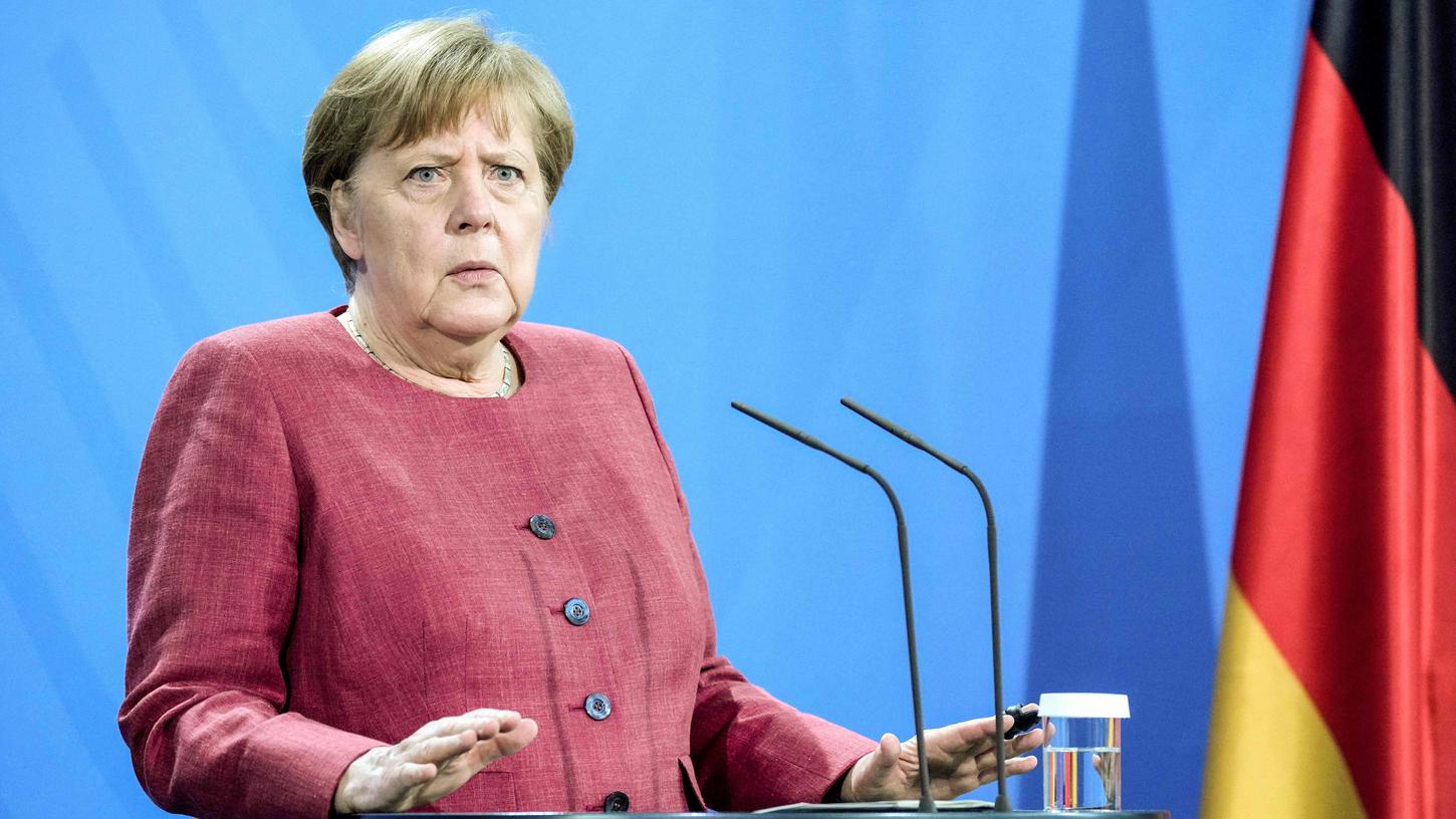 Kanzlerin Angela Merkel weist darauf hin, dass die Pandemie noch nicht vorbei ist.