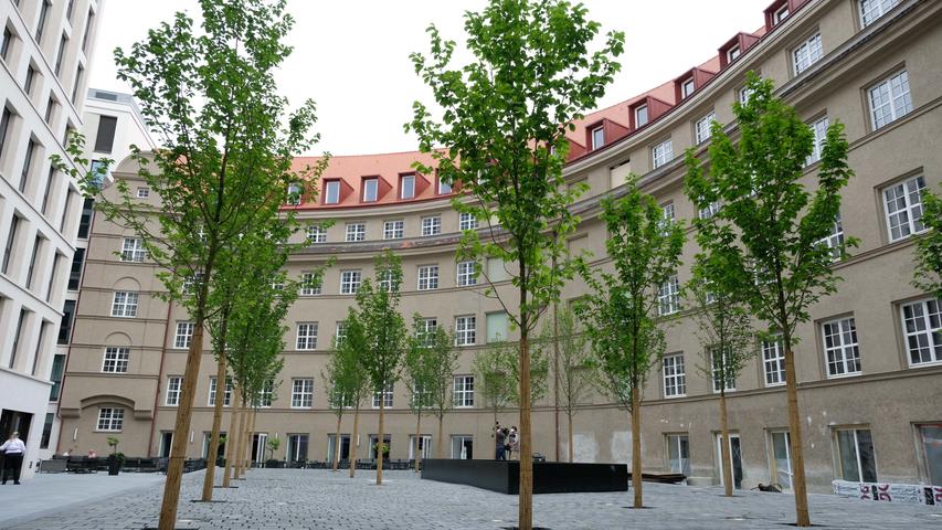 Frisch gepflanzte Bäume und ein Blick auf den historischen Rundbau: Die Terrasse des neuen Leonardo Royal soll auch die Nürnberger anlocken.