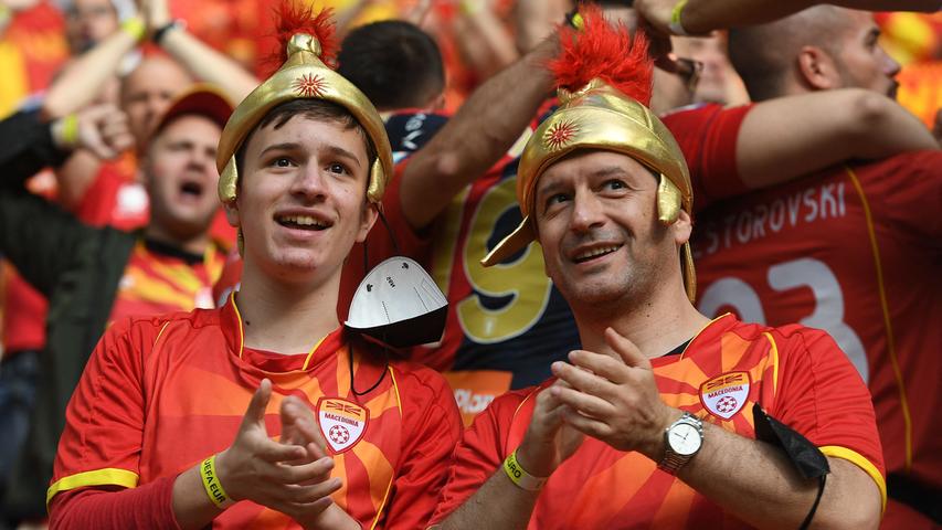 North Macedonia fans cheer prior to the UEFA EURO 2020 Group C football match between Austria and North Macedonia at the National Arena in Bucharest on June 13, 2021. (Photo by Daniel MIHAILESCU / POOL / AFP)