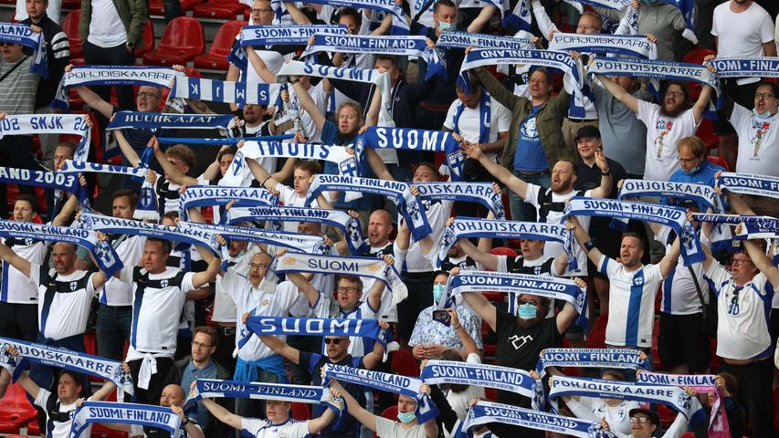 Finland fans cheer for their team ahead of the UEFA EURO 2020 Group B football match between Denmark and Finland at the Parken Stadium in Copenhagen on June 12, 2021. (Photo by WOLFGANG RATTAY / various sources / AFP)