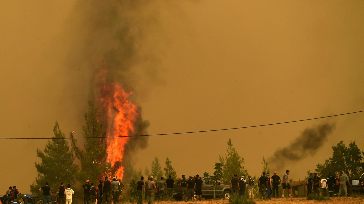 In Griechenland (wie hier auf der Insel Euböa) toben heftige Waldbrände. 