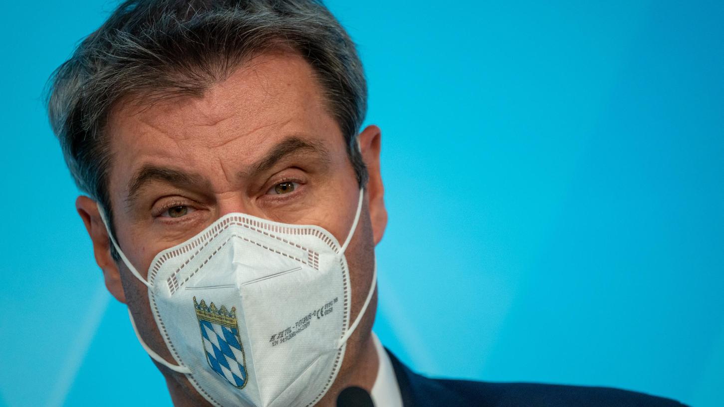 Söder will weiter FFP2-Maske tragen, den Bayern schreibt er das nicht mehr vor.