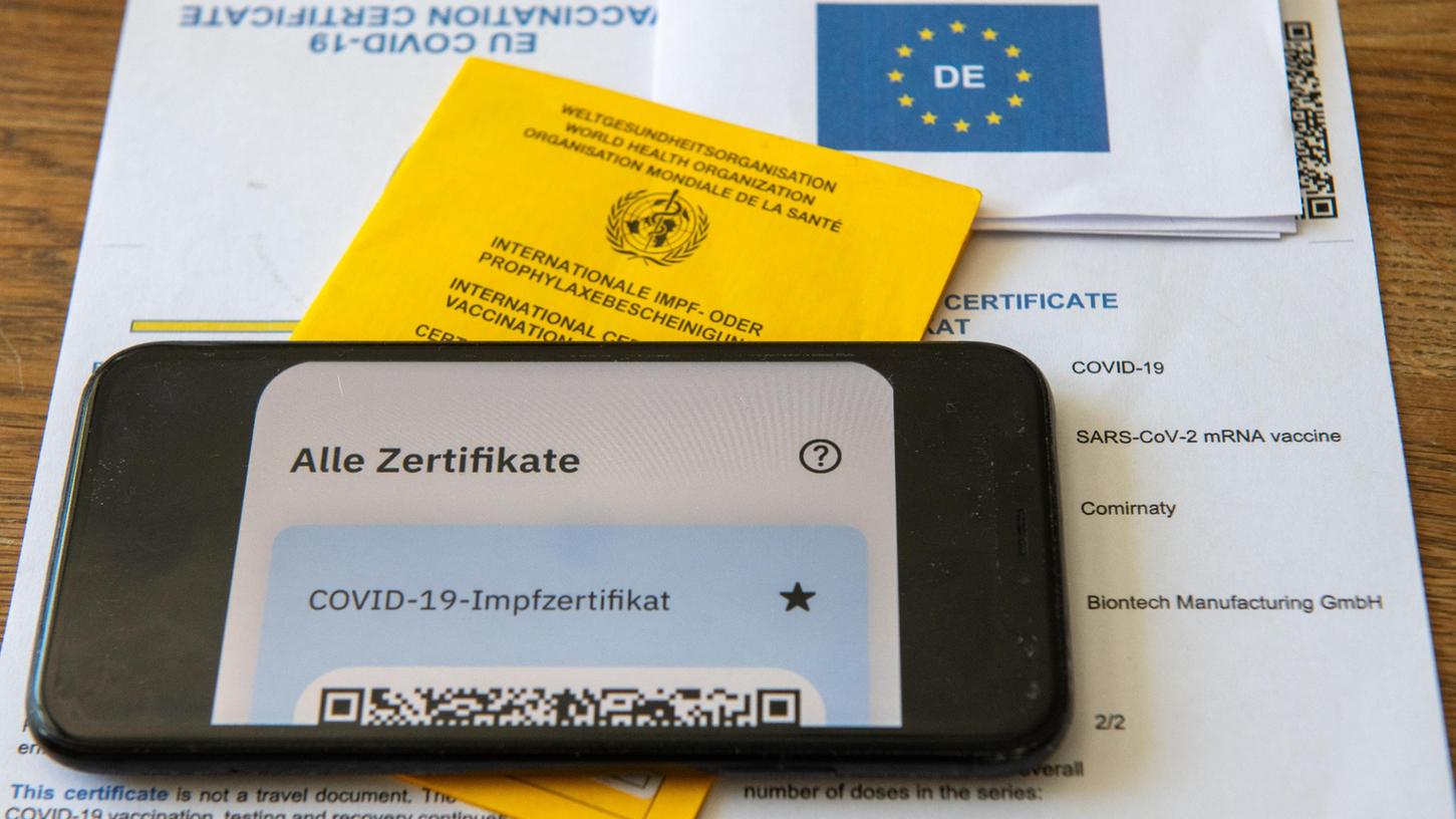 Reisende konnten am Mittwoch ihr britisches Online-Impfzertifikat nicht herunterladen.
Reisende konnten am Mittwoch ihr britisches Online-Impfzertifikat nicht herunterladen.