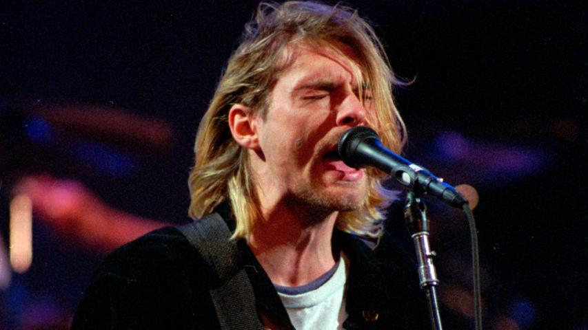 Kurt Cobain 1993 bei einem Live-Konzert.
Kurt Cobain 1993 bei einem Live-Konzert.