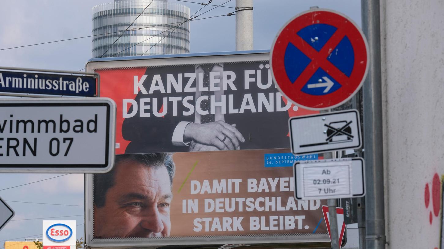 Ein halber Scholz, ein halber Söder: Die politische Lage nach der Bundestagswahl ist so unübersichtlich geworden wie rund um diese Wahlplakate an der Ostendstraße.
