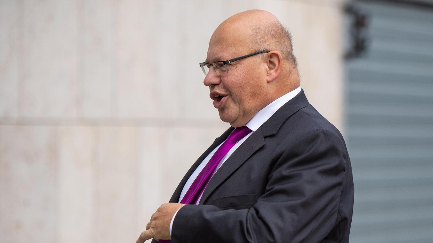 Bundeswirtschaftsminister Altmaier sagt ein Wirtschaftswachstum für 2022 voraus.