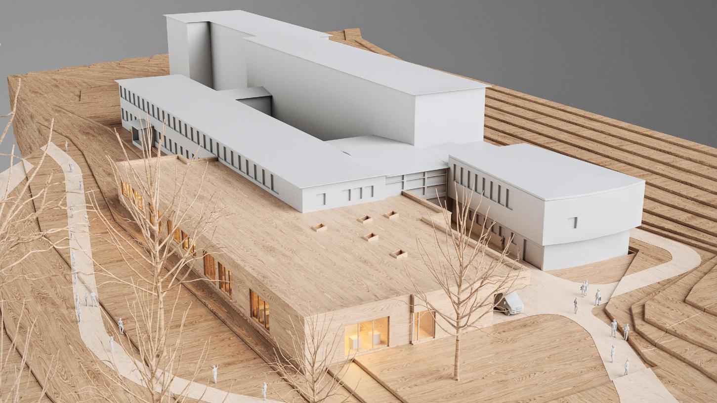 So stellt sich das Architektenbüro Planbau die Erweiterung der Berufsschule Gunzenhausen vor, im Vordergrund der Neubau, dahinter der Gebäudebestand, wo im Obergeschoss einige Sanierungsarbeiten vom Schulausschuss des Kreistags mitbeschlossen wurde.
So stellt sich das Architektenbüro Planbau die Erweiterung der Berufsschule Gunzenhausen vor, im Vordergrund der Neubau, dahinter der Gebäudebestand, wo im Obergeschoss einige Sanierungsarbeiten vom Schulausschuss des Kreistags mitbeschlossen wurde.