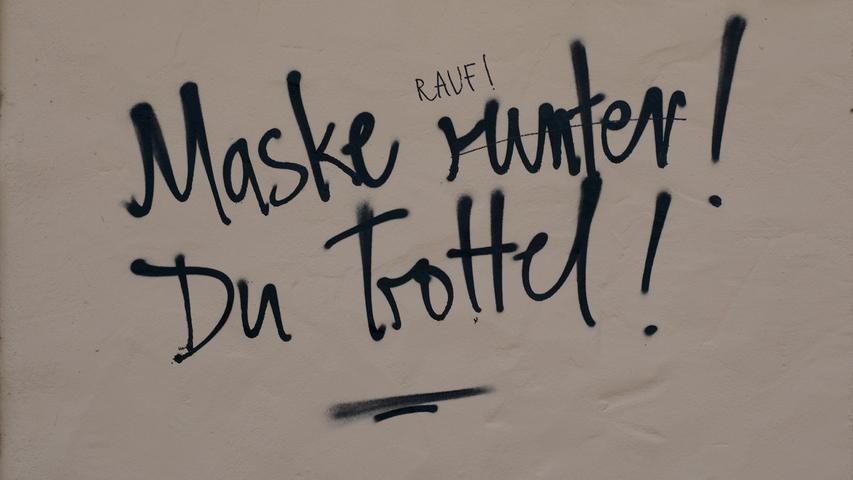 Ein Graffiti an einer Hauswand in Tübingen. Maskenverweigerern sind und waren die Corona-Regeln sowieso egal, sie pfeifen deshalb auch auf den "Freedom Day".