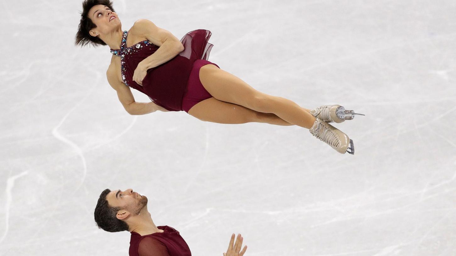 Das kanadische Duo Meagan Duhamel und Eric Radford in Aktion. Das kanadische Duo Meagan Duhamel und Eric Radford in Aktion.