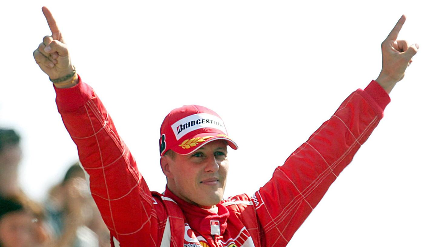 Formel-1-Legende Michael Schumacher bei seinem Sieg beim Großen Preis von Italien in Monza im Jahr 2006. Formel-1-Legende Michael Schumacher bei seinem Sieg beim Großen Preis von Italien in Monza im Jahr 2006.