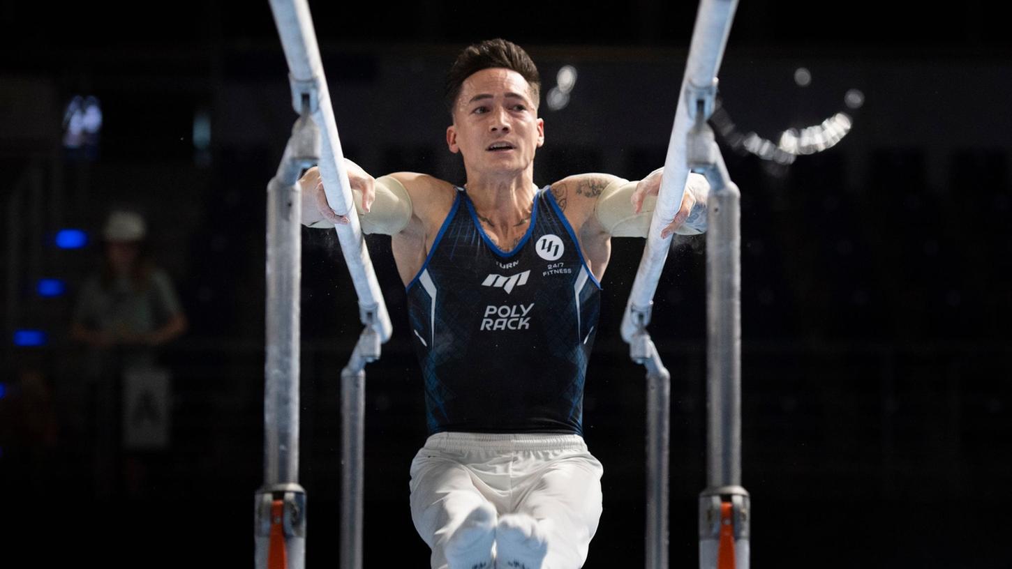 Will seine Turn-Karriere bis zu den Olympischen Spielen 2024 fortsetzen: Marcel Nguyen beim Mehrkampf am Barren. Will seine Turn-Karriere bis zu den Olympischen Spielen 2024 fortsetzen: Marcel Nguyen beim Mehrkampf am Barren.