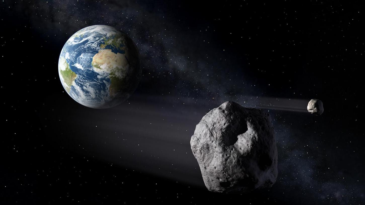 Das Handout-Foto der European Space Agency (ESA) zeigt die im Rahmen der Mission Asteroid Impact simulierte Begegnung von Asteroiden mit der Erde.
