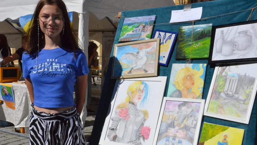 "Kinder des Krieges", so hat die 13-jährige Polianna aus der Ukraine ihre Bilder benannt, die sie beim Bürgerfest am Stand der Ukrainerinnen zeigte.