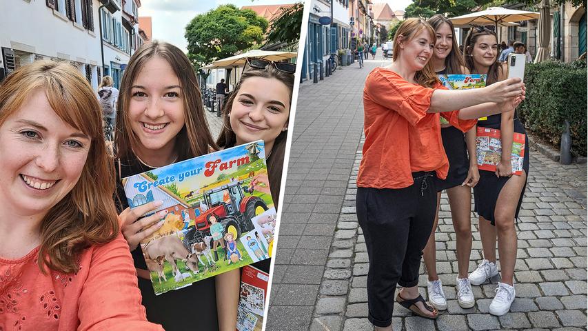 Lilly und Lucy posieren gerne mit Reporterin Nina in der Schiffstraße für ein Selfie.
