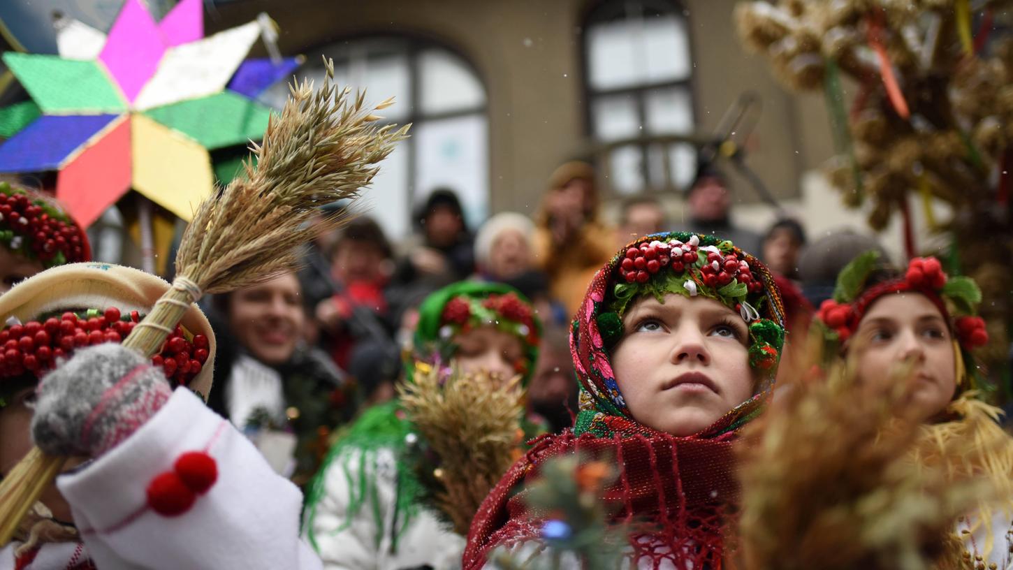 Am ukrainischen Weihnachtsfest ziehen die Kinder – wie hier in Kiew – von Haus zu Haus, singen und sagen Gedichte auf.
