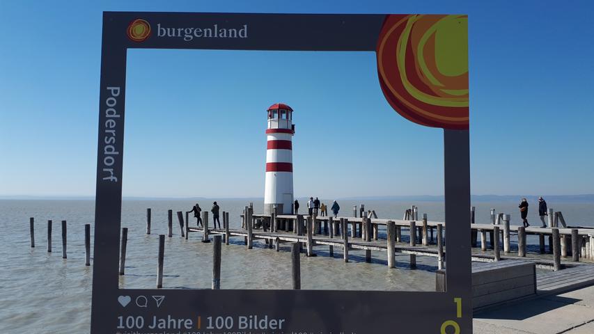 Postkarten-Idylle, zum Greifen nah: der Landungssteg mit Leuchtturm von Podersdorf am Ostufer des Neusiedler Sees. Gerade hier herrscht freilich in der Hauptsaison großes Gedränge.