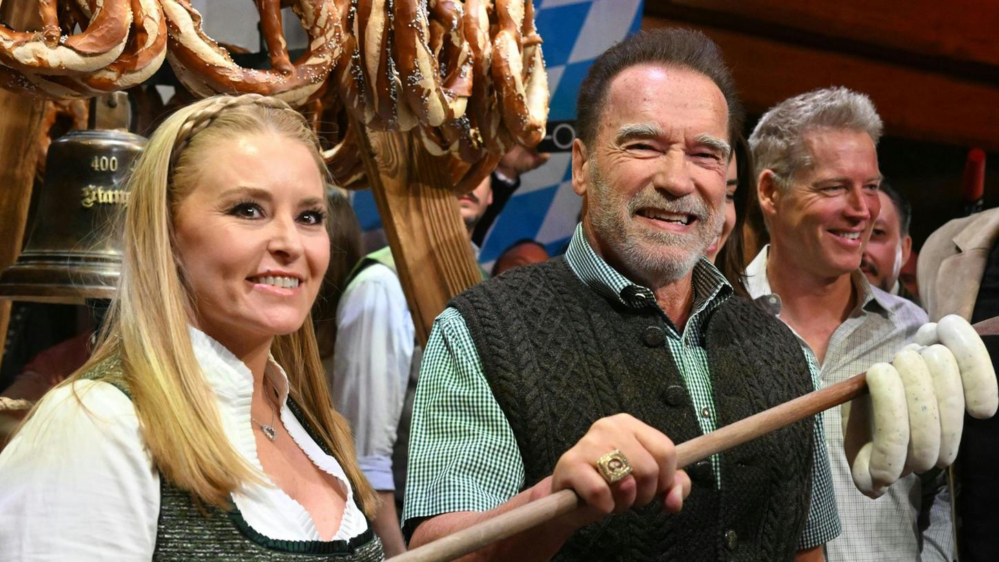 Arnold Schwarzenegger und seine Freundin Heather Milligan haben Spaß in Österreich.