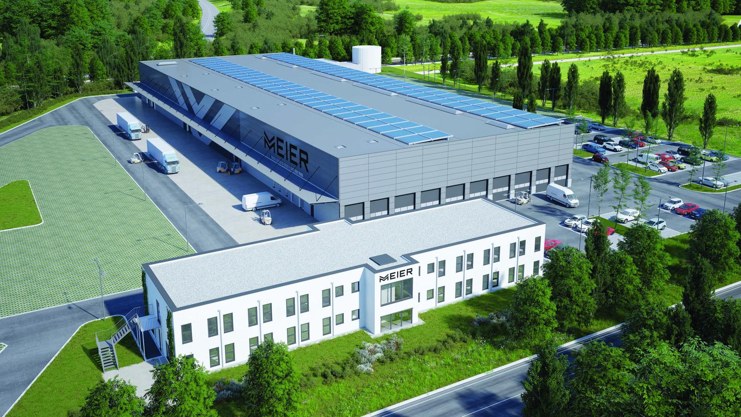Der neue Firmensitz von Fahrzeugbau Meier: parallel zur Herrnau das Verwaltungsgebäude, dahinter die große Produktionshalle.