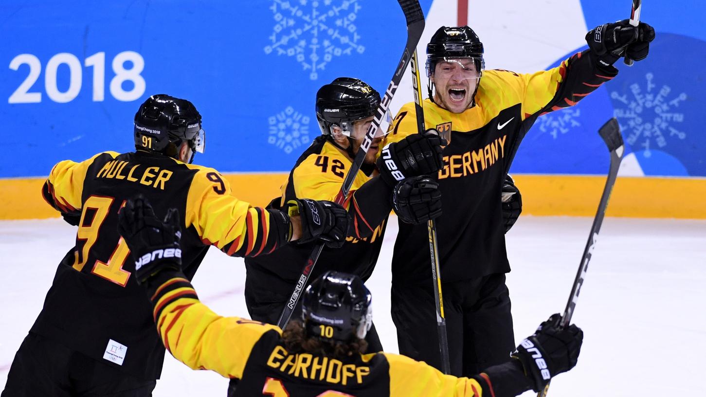 Der größte Erfolg in der Geschichte des deutschen Eishockey - und Patrick Reimer (rechts) hat ihn erst möglich gemacht. Was dazu nötig war, will er künftig weitergeben.