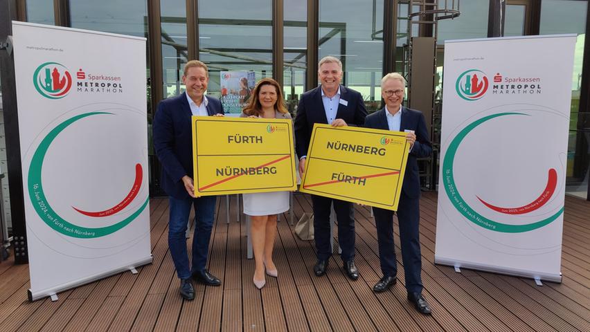 Der Bürgermeister der Stadt Fürth, Markus Braun, und die Referentin für Schule und Sport der Stadt Nürnberg, Cornelia Trinkl, stellten gemeinsam mit den Vertretern der Sparkasse Fürth, Adolf Dodenhöft, und der Sparkasse Nürnberg, Michael Kläver (v. li.), das Anmeldeportal im Internetauftritt des Sparkassen Metropolmarathons 2024 vor. Der Bürgermeister der Stadt Fürth, Markus Braun, und die Referentin für Schule und Sport der Stadt Nürnberg, Cornelia Trinkl, stellten gemeinsam mit den Vertretern der Sparkasse Fürth, Adolf Dodenhöft, und der Sparkasse Nürnberg, Michael Kläver (v. li.), das Anmeldeportal im Internetauftritt des Sparkassen Metropolmarathons 2024 vor.