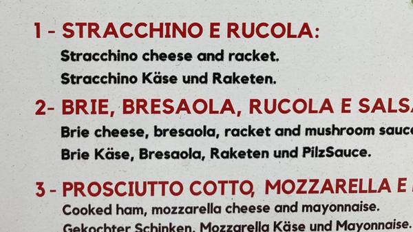 Gesehen am Hauptplatz in Mantua auf einer Speisekarte von Siegfried Zinecker aus Nürnberg.