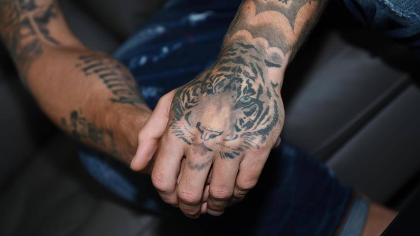 Das Tiger-Tattoo des Fußballspielers Sebastian Polter. Das Tiger-Tattoo des Fußballspielers Sebastian Polter.