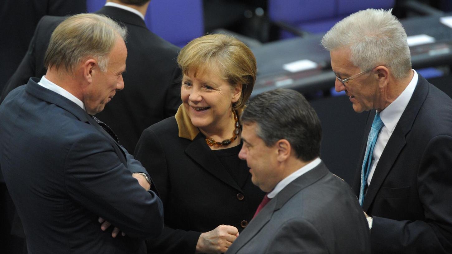 Angela Merkel 2012 mit Jürgen Trittin (l).