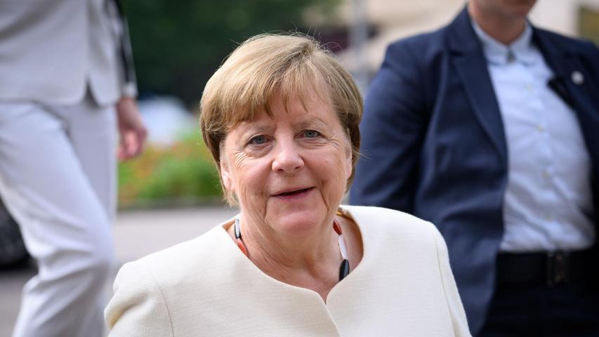 Die ehemalige Bundeskanzlerin Angela Merkel ruft zum Einsatz für Demokratie und zur Verteidigung des Grundgesetzes auf.