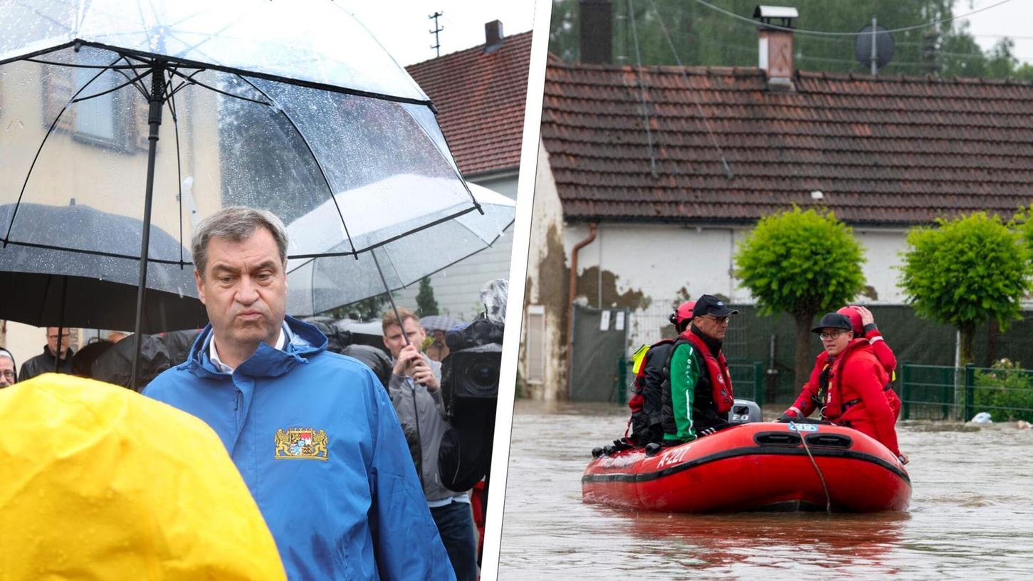 Ministerpräsident Markus Söder verschafft sich am Nachmittag ein Bild von der Lage im Kreis Augsburg. Dort wurden Menschen mit Booten und Helikoptern vor den Wassermassen aus ihren Häusern gerettet.