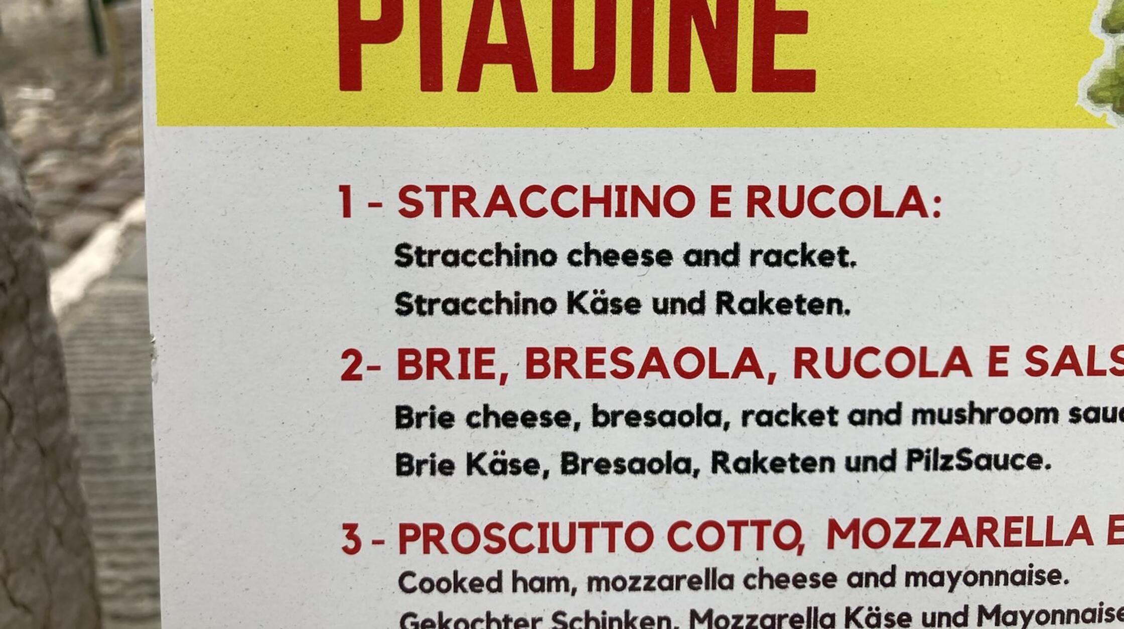 Gesehen am Hauptplatz in Mantua als Teil einer Speisekarte von Siegfried Zinecker aus Nürnberg.;