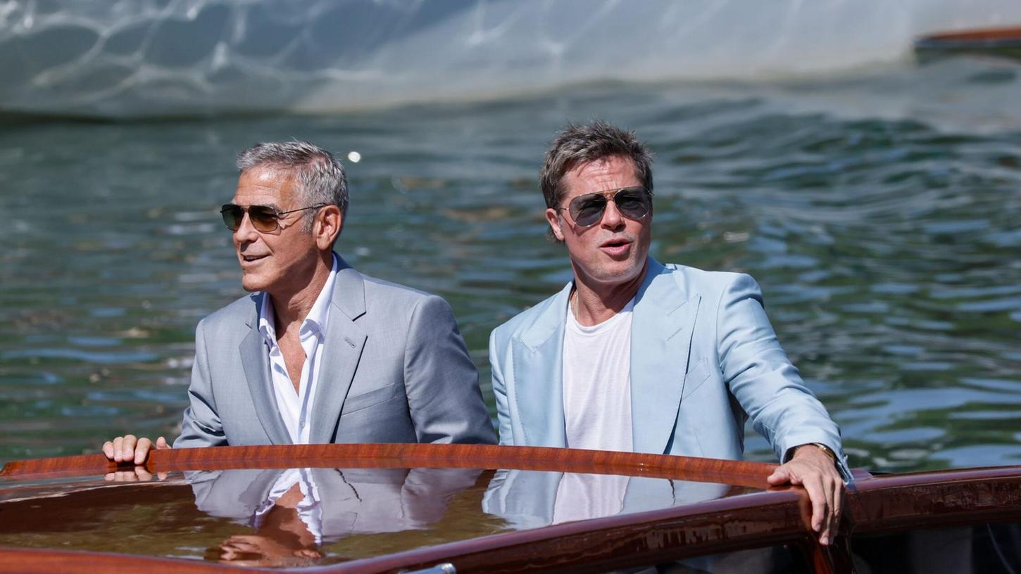 Brad Pitt (r) und George Clooney sind für die Premiere ihres neuen Films nach Venedig gekommen. Brad Pitt (r) und George Clooney sind für die Premiere ihres neuen Films nach Venedig gekommen.