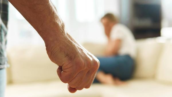 Scared woman victim of domestic violence attacked