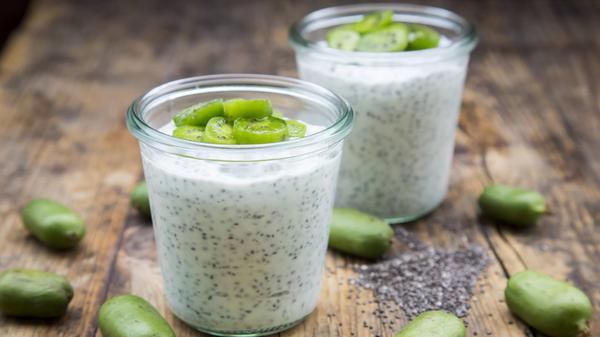 Two glasses of natural yoghurt with chia seeds and