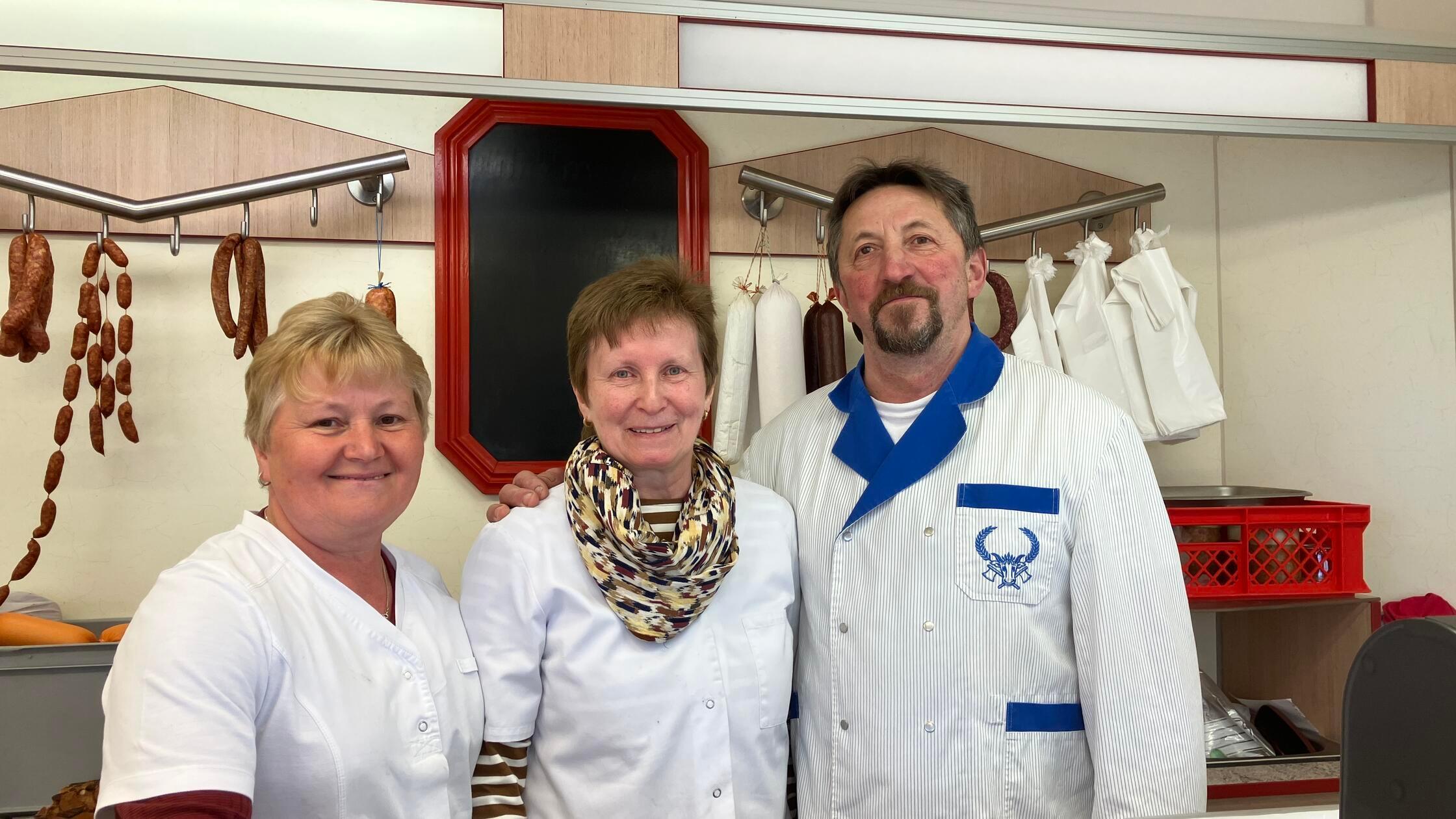 Metzger Lyrhammer mit Frau und Angestellter quer