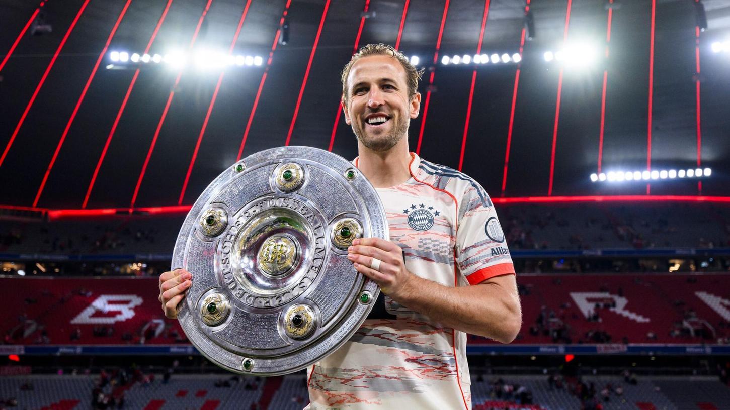 Harry Kane mit der Meisterschale. Harry Kane mit der Meisterschale.