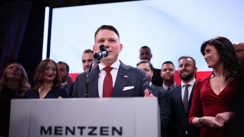 Der rechtsextreme Kandidat Slawomir Mentzen, der in der ersten Runde der polnischen Präsidentenwahl auf dem dritten Platz landete, will seinen Anhängern eine Wahlempfehlung geben. Der rechtsextreme Kandidat Slawomir Mentzen, der in der ersten Runde der polnischen Präsidentenwahl auf dem dritten Platz landete, will seinen Anhängern eine Wahlempfehlung geben.