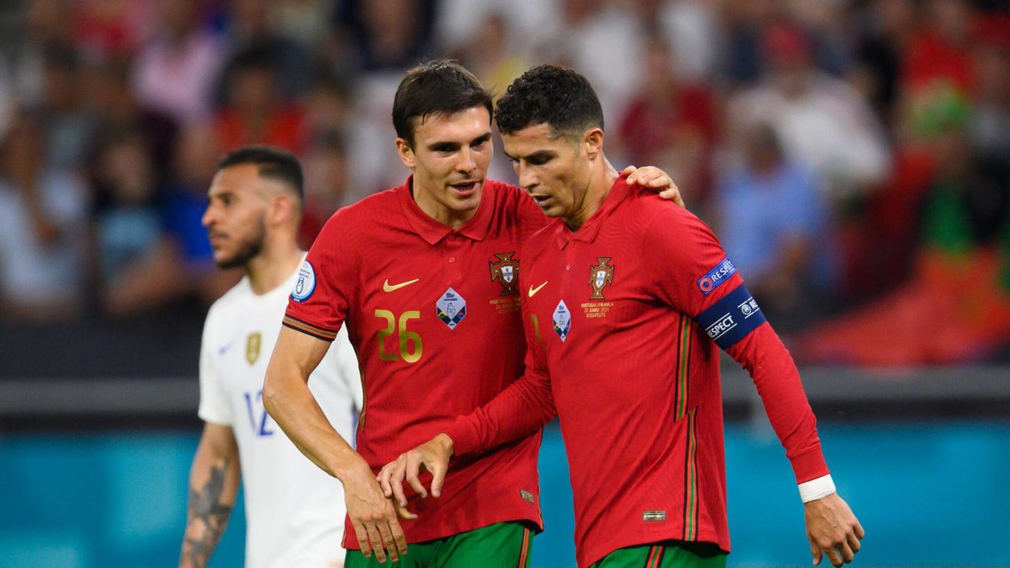 Joao Palhinha und Cristiano Ronaldo (r) werden mit Portugal gegen Deutschland spielen. Joao Palhinha und Cristiano Ronaldo (r) werden mit Portugal gegen Deutschland spielen.